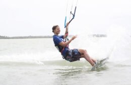 Me doing a slide turn, smiling – proof enough that kitesurfing makes you happy