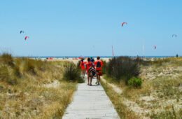 Teens walking towards the kite beach in Tarifa