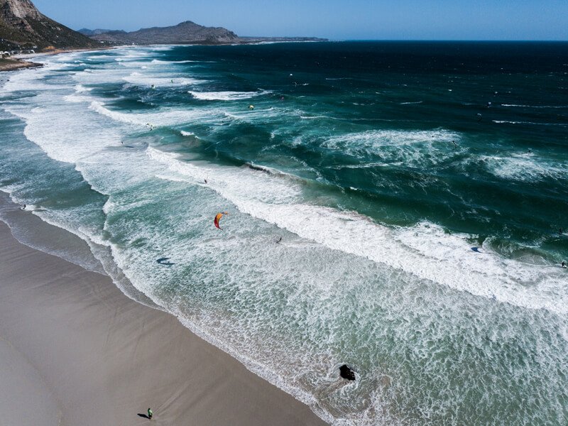 Kitesurfing in the waves of Misty Cliffs, Scarborough, South Africa